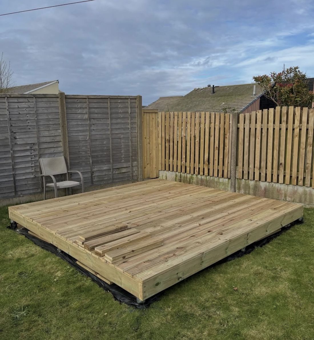 Ground screw decking frame under construction